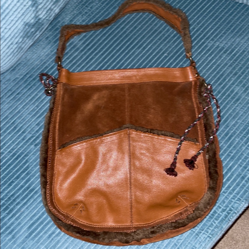 Cul-de-sac brown genuine leather shoulder bag, approximately 15” x 15”